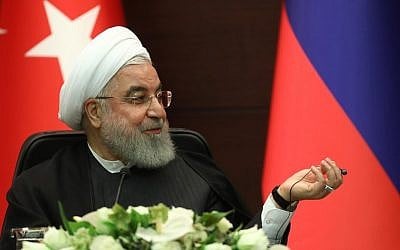 Iranian President Hassan Rouhani speaks during a joint press conference with Turkish and Russian counterparts following a trilateral meeting on Syria, in Ankara on September 16, 2019. (Adem Altan/AFP)