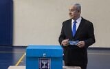 Then-prime minister Benjamin Netanyahu casts his ballot at a voting station in Jerusalem on September 17, 2019. (Heidi Levine/AFP)