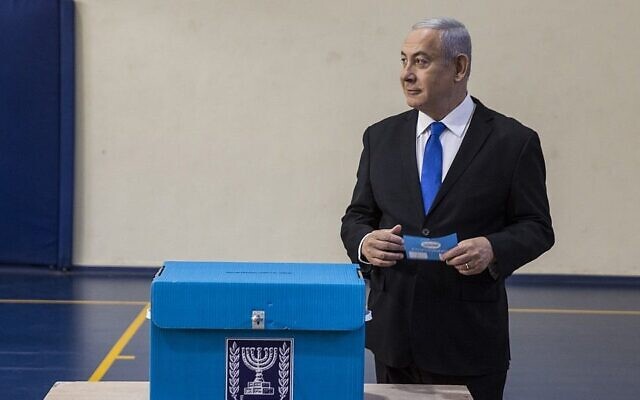 Then-prime minister Benjamin Netanyahu casts his ballot at a voting station in Jerusalem on September 17, 2019. (Heidi Levine/AFP) Then-prime minister Benjamin Netanyahu casts his ballot at a voting station in Jerusalem on September 17, 2019. (Heidi Levine/AFP)