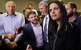 Ayelet Shaked (R), leader and candidate of the New Right party that is part of the Yamina political alliance, speaks to the press while flanked by Jewish Home member and candidate Moti Yogev (L), National Union party leader and candidate Bezalel Smotrich (2nd-L), (Gil Cohen-Magen/AFP)