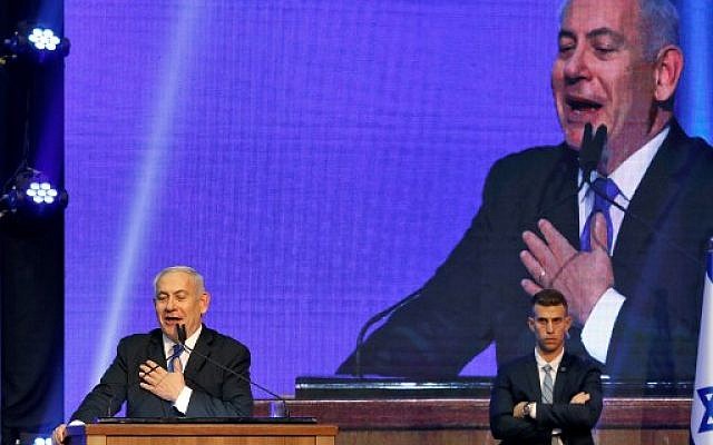 Israeli Prime Minister Benjamin Netanyahu addresses supporters at his Likud party's electoral campaign headquarters early on September 18, 2019.(MENAHEM KAHANA / AFP) Israeli Prime Minister Benjamin Netanyahu addresses supporters at his Likud party's electoral campaign headquarters early on September 18, 2019.(MENAHEM KAHANA / AFP)