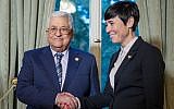 Norwegian Foreign Ministers Ine Eriksen Soreide welcomes Palestinian Authority President Mahmoud Abbas for a dinner in Oslo, Norway, on Septmeber 18, 2019. (Heiko Junge/NTB Scanpix/AFP)