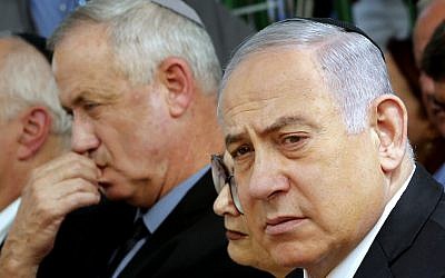 Prime Minister Benjamin Netanyahu (R), and Benny Gantz (L), leader of Blue and White party, at a memorial ceremony for late president Shimon Peres, at Mount Herzl in Jerusalem on September 19, 2019. (Gil Cohen-Magen/AFP)