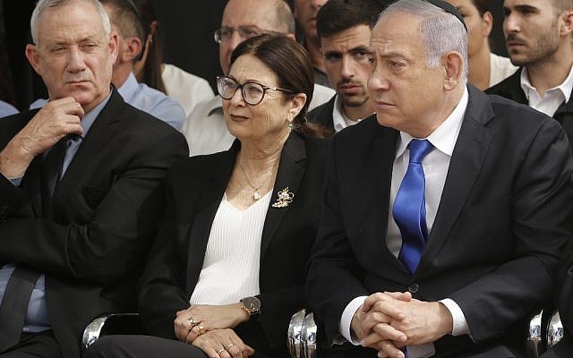 Prime Minister Benjamin Netanyahu (R), Supreme Court Chief Justice Esther Hayut (C) and Benny Gantz (L), leader of the Blue and White party, attend a memorial ceremony for late president Shimon Peres at Mount Herzl in Jerusalem on September 19, 2019. (Gil Cohen-Magen/AFP) Prime Minister Benjamin Netanyahu (R), Supreme Court Chief Justice Esther Hayut (C) and Benny Gantz (L), leader of the Blue and White party, attend a memorial ceremony for late president Shimon Peres at Mount Herzl in Jerusalem on September 19, 2019. (Gil Cohen-Magen/AFP)