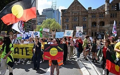 People attend a protest march as part of the world's largest climate strike in Sydney on September 20, 2019. (PETER PARKS / AFP)