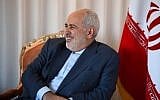 Iranian Foreign Minister Mohammad Zarif smiles as he meets French Minister of Foreign Affairs Jean-Yves Le Drian (not seen) on September 22, 2019 in New York City. (Johannes EISELE / AFP)