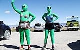 Women are dressed as aliens at a 'Storm Area 51' spinoff event called 'Alienstock' on September 20, 2019 in Rachel, Nevada. (Mario Tama/Getty Images/AFP)