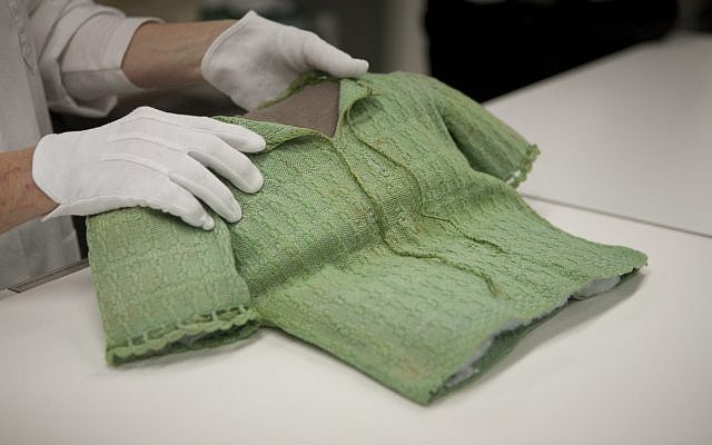 Krystyna Chiger's green sweater. (Courtesy of the US Holocaust Memorial Museum)