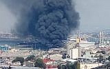 Smoke rises from a blaze at a plan in Haifa's port, September 5, 2019 (Courtesy firefighting services)