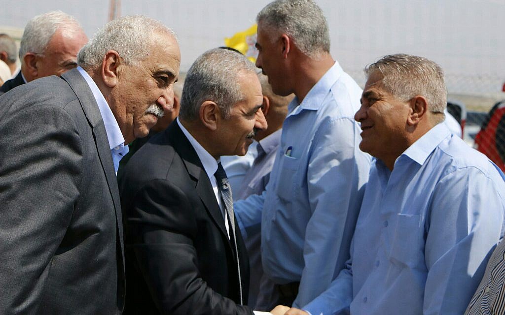 Palestinian Authority Prime Minister Mohammad Shtayyeh greeting residents of Fasayil, a Palestinian village in the Jordan Valley, on September 16, 2019. (Wafa) Palestinian Authority Prime Minister Mohammad Shtayyeh greeting residents of Fasayil, a Palestinian village in the Jordan Valley, on September 16, 2019. (Wafa)