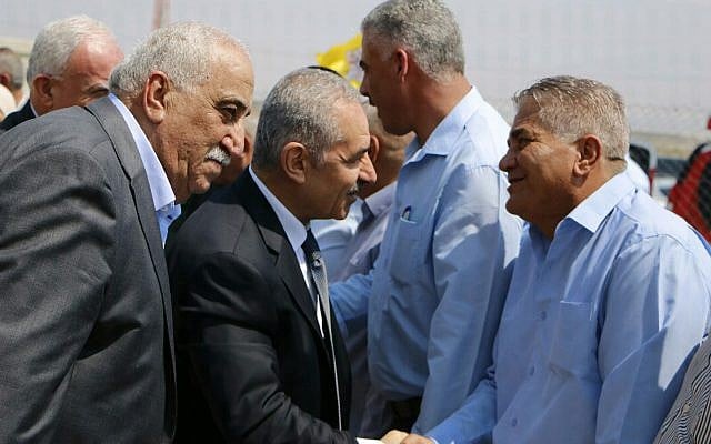 Palestinian Authority Prime Minister Mohammad Shtayyeh greeting residents of Fasayil, a Palestinian village in the Jordan Valley, on September 16, 2019. (Wafa) Palestinian Authority Prime Minister Mohammad Shtayyeh greeting residents of Fasayil, a Palestinian village in the Jordan Valley, on September 16, 2019. (Wafa)