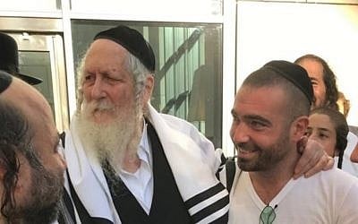Eliezer Berland (L) with Israeli pop star Omer Adam (via Facebook)