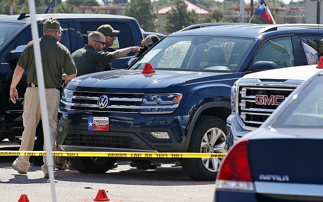 Officials continue to work the scene, September 2, 2019, in Odessa, Texas, where teenager Leilah Hernandez was fatally shot at a car dealership during a shooting rampage. (AP Photo/Sue Ogrocki) Officials continue to work the scene, September 2, 2019, in Odessa, Texas, where teenager Leilah Hernandez was fatally shot at a car dealership during a shooting rampage. (AP Photo/Sue Ogrocki)