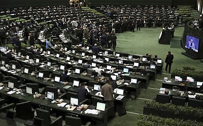 Iranian lawmakers attend a session of parliament to debate President Hassan Rouhani's proposed tourism and education ministers, in Tehran, Iran, September 3, 2019. (AP Photo/Vahid Salemi)