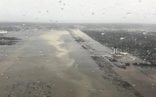 This September 2, 2019 photo released by the US Coast Guard Station Clearwater, shows flooding on the runway of the Marsh Harbour Airport in the Bahamas. (US Coast Guard Station Clearwater via AP)