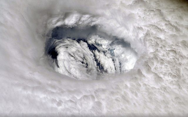 This September 2, 2019 photo provided by NASA shows the eye of Hurricane Dorian shown from the International Space Station. (Nick Hague/NASA via AP)
