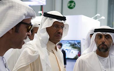 Saudi Arabia's new Energy Minister Prince Abdulaziz bin Salman, center, and United Arab Emirates Energy Minister Suhail al-Mazrouei, right, walk through an energy exhibition in Abu Dhabi, United Arab Emirates, September 9, 2019. (Jon Gambrell/AP)