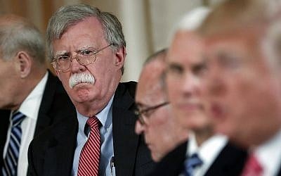 In this photo from April 18, 2018, then-national security adviser John Bolton, left, listens to IS President Donald Trump, far right, speak during a working lunch with Japanese Prime Minister Shinzo Abe at Trump' s private Mar-a-Lago club in Palm Beach, Florida. (AP Photo/Pablo Martinez Monsivais)