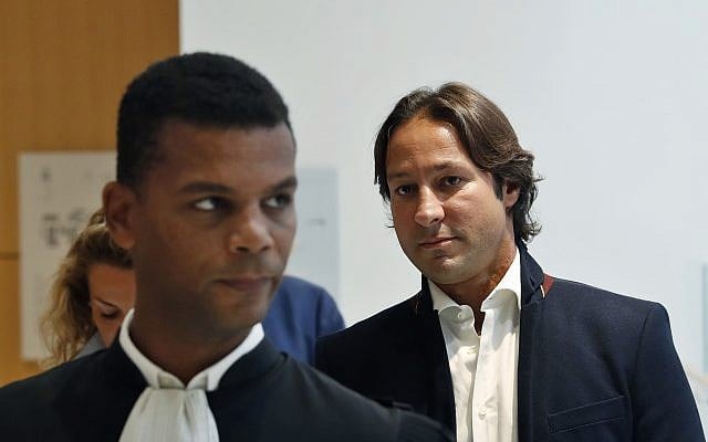Saudi princess Hassa bint Salman's bodyguard Raina Said, right, arrives at the courthouse with his lawyer Yassine Bouzrou, left, in Paris, September 12, 2019. The only daughter of Saudi Arabia's King Salman has been found guilty by a Paris court of charges that she ordered her bodyguard to detain and strike a plumber for taking photos at the Saudi royal family's apartment in the French capital. (AP Photo/Thibault Camus)