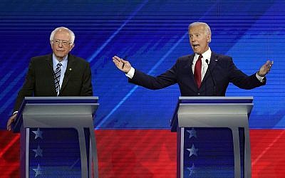 Sen. Bernie Sanders, I-Vt., left, listens as former Vice President Joe Biden, right, responds to a question Thursday, Sept. 12, 2019, during a Democratic presidential primary debate hosted by ABC at Texas Southern University in Houston. (AP Photo/David J. Phillip)