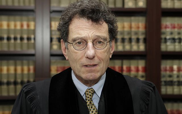 This Jan. 11, 2018 file photo shows Judge Dan Polster in his office, in Cleveland. (AP/Tony Dejak) This Jan. 11, 2018 file photo shows Judge Dan Polster in his office, in Cleveland. (AP/Tony Dejak)