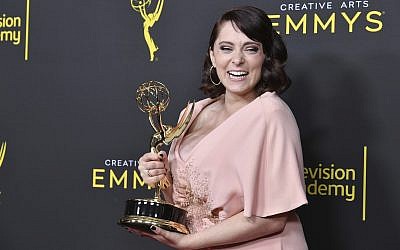 Rachel Bloom poses in the press room with the award for outstanding original music and lyrics for "Crazy Ex Girlfriend" on night one of the Creative Arts Emmy Awards on Saturday, Sept. 14, 2019, at the Microsoft Theater in Los Angeles. (Richard Shotwell/Invision/AP)