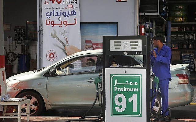 A worker refuels a car at a gas station in Jiddah, Saudi Arabia, September 16, 2019. (Amr Nabil/AP) A worker refuels a car at a gas station in Jiddah, Saudi Arabia, September 16, 2019. (Amr Nabil/AP)