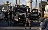 Illustrative: Border Police officers deploy at the Qalandiya checkpoint north of Jerusalem after an apparent stabbing attack, September 18, 2019. (AP Photo/Majdi Mohammed)