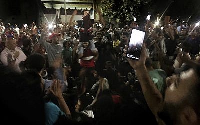 Protesters chant slogans against the regime in Cairo, Egypt, September 21, 2019. Dozens of people held a rare protest in Cairo during which they called on Egyptian President Abdel-Fattah el-Sissi to quit. (AP Photo/Nariman El-Mofty)