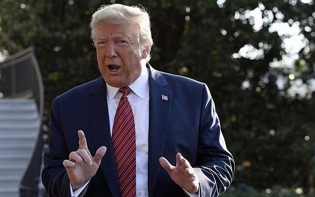 US President Donald Trump talks with reporters before leaving on Marine One on the South Lawn of the White House in Washington, September 22, 2019. (AP Photo/Susan Walsh) US President Donald Trump talks with reporters before leaving on Marine One on the South Lawn of the White House in Washington, September 22, 2019. (AP Photo/Susan Walsh)