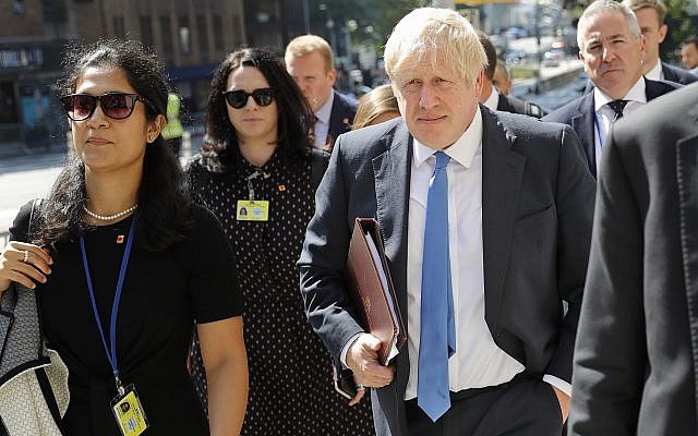 Britain's Prime Minister Boris Johnson walks down the street near United Nations headquarters in New York, September 23, 2019. (AP Photo/Seth Wenig) Britain's Prime Minister Boris Johnson walks down the street near United Nations headquarters in New York, September 23, 2019. (AP Photo/Seth Wenig)