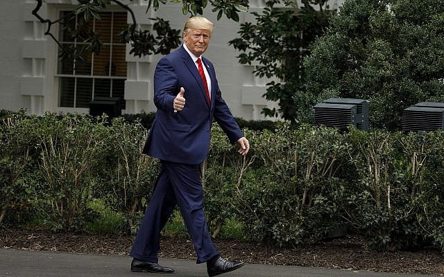 US President Donald Trump gives the thumbs-up as he arrives for a ceremony on the South Lawn of the White House in Washington, September 26, 2019 (AP Photo/Carolyn Kaster) US President Donald Trump gives the thumbs-up as he arrives for a ceremony on the South Lawn of the White House in Washington, September 26, 2019 (AP Photo/Carolyn Kaster)