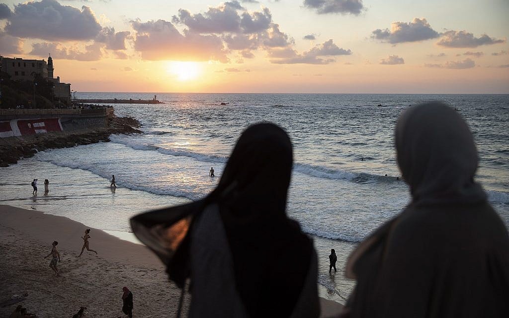 In this photo from September 23, 2019, Two Arab Israeli women overlook the Mediterranean sea, in the mixed Arab and Jewish city of Jaffa, near Tel Aviv. (AP Photo/Oded Balilty) In this photo from September 23, 2019, Two Arab Israeli women overlook the Mediterranean sea, in the mixed Arab and Jewish city of Jaffa, near Tel Aviv. (AP Photo/Oded Balilty)
