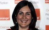 Kamila Shamsie poses for the photographers ahead of the announcement of the 2009 Orange Book prize for fiction, in London's Royal Festival Hall, June 3, 2009. (Lefteris Pitarakis/AP)