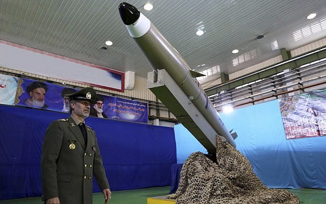 In this picture released by the official website of the Iranian Defense Ministry on August 13, 2018, Defense Minister Gen. Amir Hatami walks past a Fateh-e Mobin (Bright Conqueror) missile during inauguration of its production line at an undisclosed location, Iran. (Iranian Defense Ministry via AP) In this picture released by the official website of the Iranian Defense Ministry on August 13, 2018, Defense Minister Gen. Amir Hatami walks past a Fateh-e Mobin (Bright Conqueror) missile during inauguration of its production line at an undisclosed location, Iran. (Iranian Defense Ministry via AP)