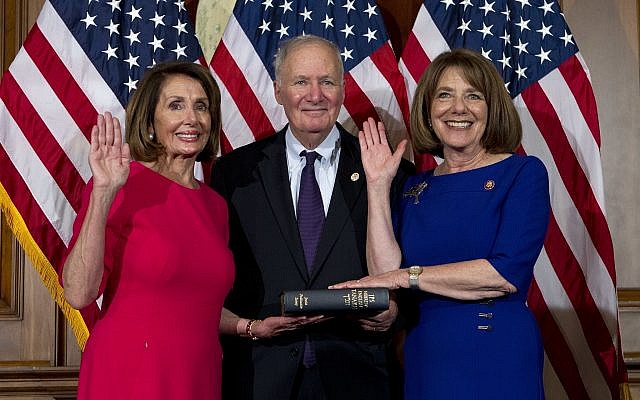 House Speaker Nancy Pelosi of Calif., administers the House oath of office to Rep. Susan Davis, D-Calif., during aceremonial swearing-in on Capitol Hill in Washington, Thursday, Jan. 3, 2019, during the opening session of the 116th Congress. (AP Photo/Jose Luis Magana) House Speaker Nancy Pelosi of Calif., administers the House oath of office to Rep. Susan Davis, D-Calif., during aceremonial swearing-in on Capitol Hill in Washington, Thursday, Jan. 3, 2019, during the opening session of the 116th Congress. (AP Photo/Jose Luis Magana)
