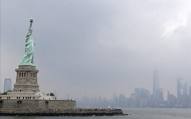 This photo shows the Statue of Liberty on a stormy afternoon in New York on Wednesday, Aug. 14, 2019. (AP Photo/Kathy Willens) This photo shows the Statue of Liberty on a stormy afternoon in New York on Wednesday, Aug. 14, 2019. (AP Photo/Kathy Willens)