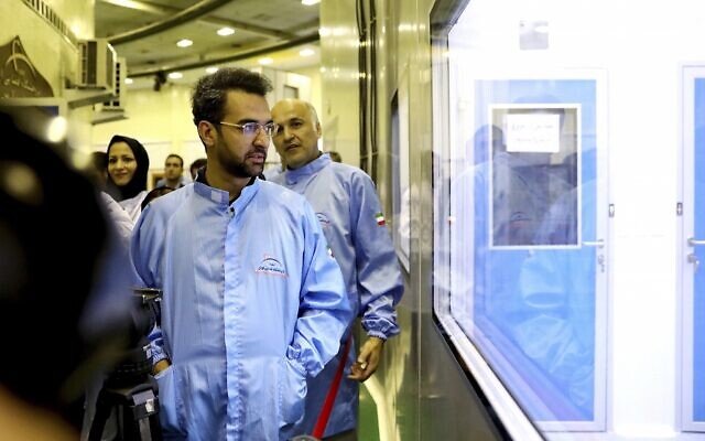 In this August 31, 2019 photo, Iran's Minister of Information and Communications Technology Mohammad Javad Azari Jahromi looks at The Nahid-1 domestically built satellite at the space research center in Tehran, Iran. (Information and Communications Technology via AP) In this August 31, 2019 photo, Iran's Minister of Information and Communications Technology Mohammad Javad Azari Jahromi looks at The Nahid-1 domestically built satellite at the space research center in Tehran, Iran. (Information and Communications Technology via AP)