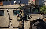 An Israeli soldier secures the village of Avivim on the Israel-Lebanon border, Monday, Sept. 2, 2019 (AP Photo/Ariel Schalit)
