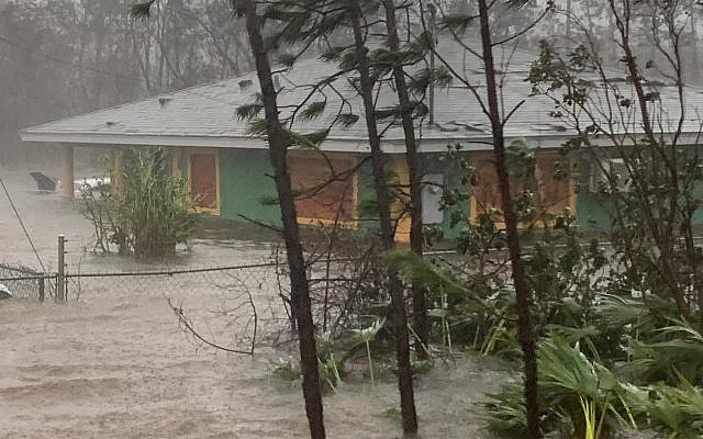Rain brought on by Hurricane Dorian continues to pour in Freeport, Bahamas, September 3, 2019. (AP Photo/Tim Aylen)