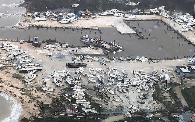 In this September 2, 2019 photo released by the US Coast Guard Station Clearwater, boats litter the area around marina in the Bahamas after they were tossed around by Hurricane Dorian. (US Coast Guard Station Clearwater via AP) In this September 2, 2019 photo released by the US Coast Guard Station Clearwater, boats litter the area around marina in the Bahamas after they were tossed around by Hurricane Dorian. (US Coast Guard Station Clearwater via AP)