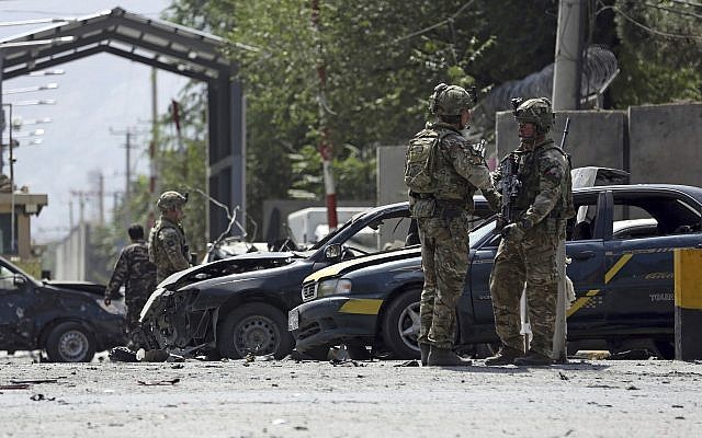Resolute Support (RS) forces inspect the site of a car bomb explosion in Kabul, Afghanistan, Sept. 5, 2019 (AP Photo/Rahmat Gul) Resolute Support (RS) forces inspect the site of a car bomb explosion in Kabul, Afghanistan, Sept. 5, 2019 (AP Photo/Rahmat Gul)