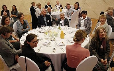 Polish people who saved Jews during World War II sit with family members and others during an event to honor them, in Warsaw, Poland, September 8, 2019. (AP Photo/Czarek Sokolowski)