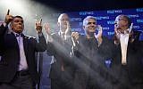 Blue and White party leaders, from the left, Gabi Ashkenazi, Benny Gantz, Yair Lapid and Moshe Ya'alon greet their supporters at party headquarters after the first results of the elections in Tel Aviv, Israel, Wednesday, Sept. 18, 2019. (AP Photo/Sebastian Scheiner)