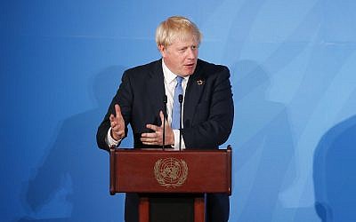 Britain's Prime Minister Boris Johnson addresses the Climate Action Summit in the United Nations General Assembly, at UN headquarters, September 23, 2019. (Jason DeCrow/AP)