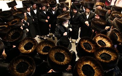 Illustrative: Rabbi Mendel Hager of the Vizhnitz Hassidic Dynasty at the Rashbi gravesite in Meron, near Tzfat, Northern Israel, December 16, 2018. (David Cohen/Flash90)