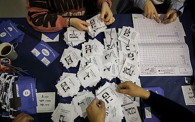 The remaining ballots from soldiers and absentees being counted at the Knesset on April 10, 2019, a day after the general elections, (Noam Revkin Fenton/Flash90)