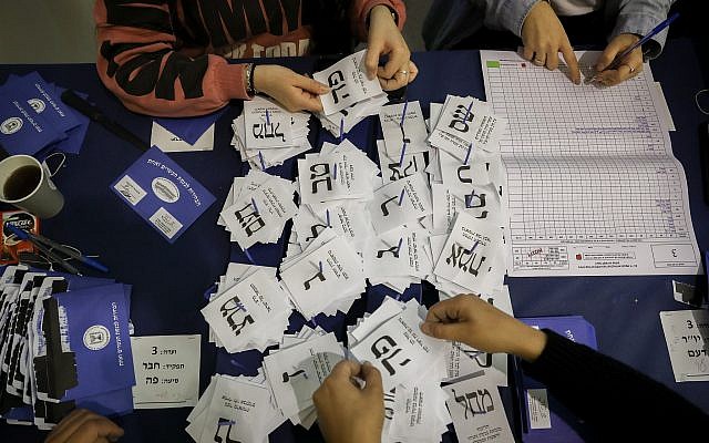 The remaining ballots from soldiers and absentees being counted at the Knesset on April 10, 2019, a day after the general elections, (Noam Revkin Fenton/Flash90) The remaining ballots from soldiers and absentees being counted at the Knesset on April 10, 2019, a day after the general elections, (Noam Revkin Fenton/Flash90)