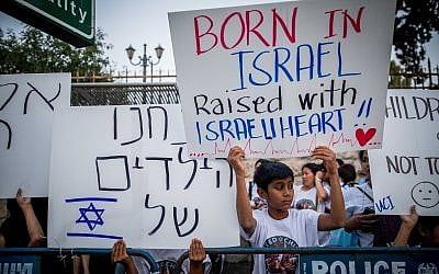 Filipino workers and their children protest against their their imminent deportation outside Prime Minister's Residence in Jerusalem on June 11, 2019. (Yonatan Sindel/Flash90)
