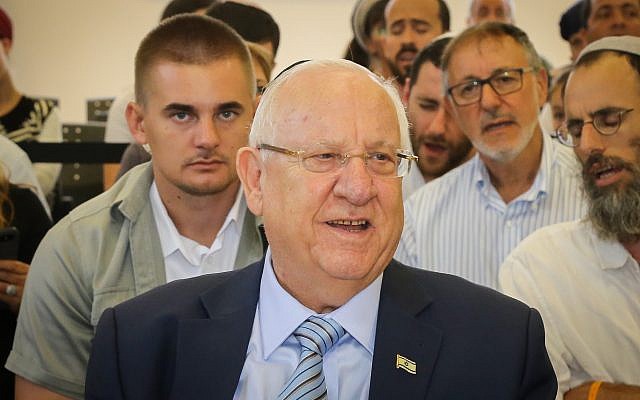 President Reuven Rivlin attends a ceremony in memory of Dvir Sorek, an 18-year-old Israeli killed in a terror attack, during the opening of the school year at the yeshiva where Sorek studied in the West Bank settlement of Migdal Oz, September 1, 2019. (Gershon Elinson/Flash90) President Reuven Rivlin attends a ceremony in memory of Dvir Sorek, an 18-year-old Israeli killed in a terror attack, during the opening of the school year at the yeshiva where Sorek studied in the West Bank settlement of Migdal Oz, September 1, 2019. (Gershon Elinson/Flash90)